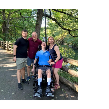 Sean is a young adult who enjoys music, nature, Pixar movies, and community involvement. He communicates using an eye-controlled device and requires comprehensive care due to multiple disabilities and medical conditions. 